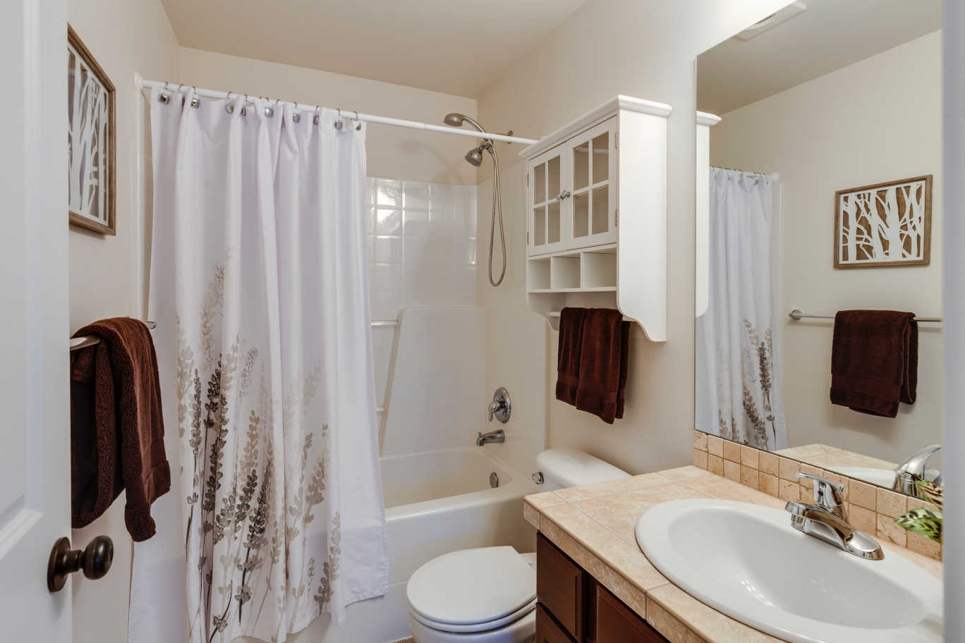 Image of a finished bathroom interior with sink and bathtub.